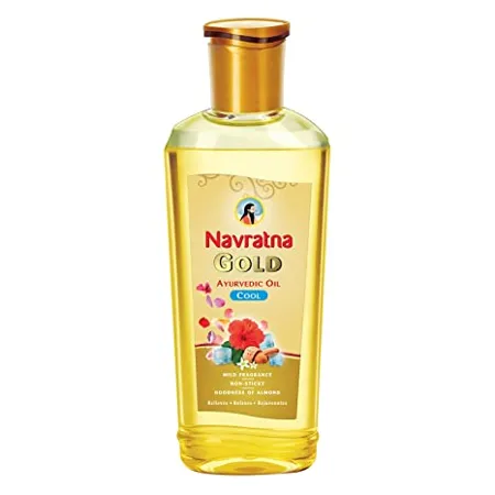 Navratna Gold Ayurvedic Oil Non Sticky and Non Greasy Mild Fragrance Goodness of Almonds and 9 Ayurvedic Herbs Relieves Body Aches Sleeplessness Headache and Fatigue 500ml