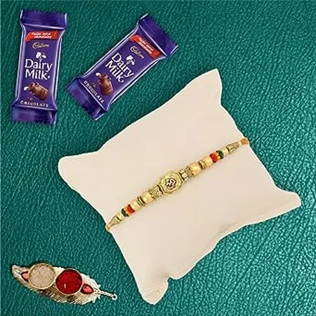 Astonished Retail Premium Designer Om Rakhi with 2 Pieces Dairy Milk Chocolates Rakhi Chocolate Gift for Brother Roli Chawal Chandan Misri 4