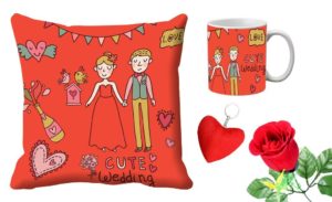 Amazon - Buy meSleep Valentine Couple Digital Printed Cushion (With Filler) & Mug With Free Artificial Rose And Key Chain at Rs 299 only