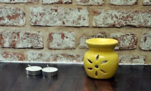 FnP Handcrafted Aroma Diffuser with Tealight Candle (9x8, Yellow) at Rs 99 only amazon