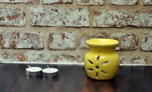 FnP Handcrafted Aroma Diffuser with Tealight Candle (9x8, Yellow) at Rs 99 only amazon