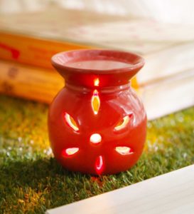 Pepperfry - Buy Red Ceramic & Wax Aroma Candle Diffuser Rose Oil by Riflection at Rs 79 only 