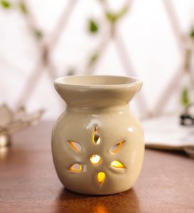 Pepperfry- Buy White Ceramic & Wax Aroma Candle Diffuser at Rs 79
