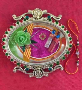 Pepperfry- Buy Golden Thali With Rakhi and Tilak at Rs 179